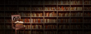 a chair with books on the background of bookshelves, library background